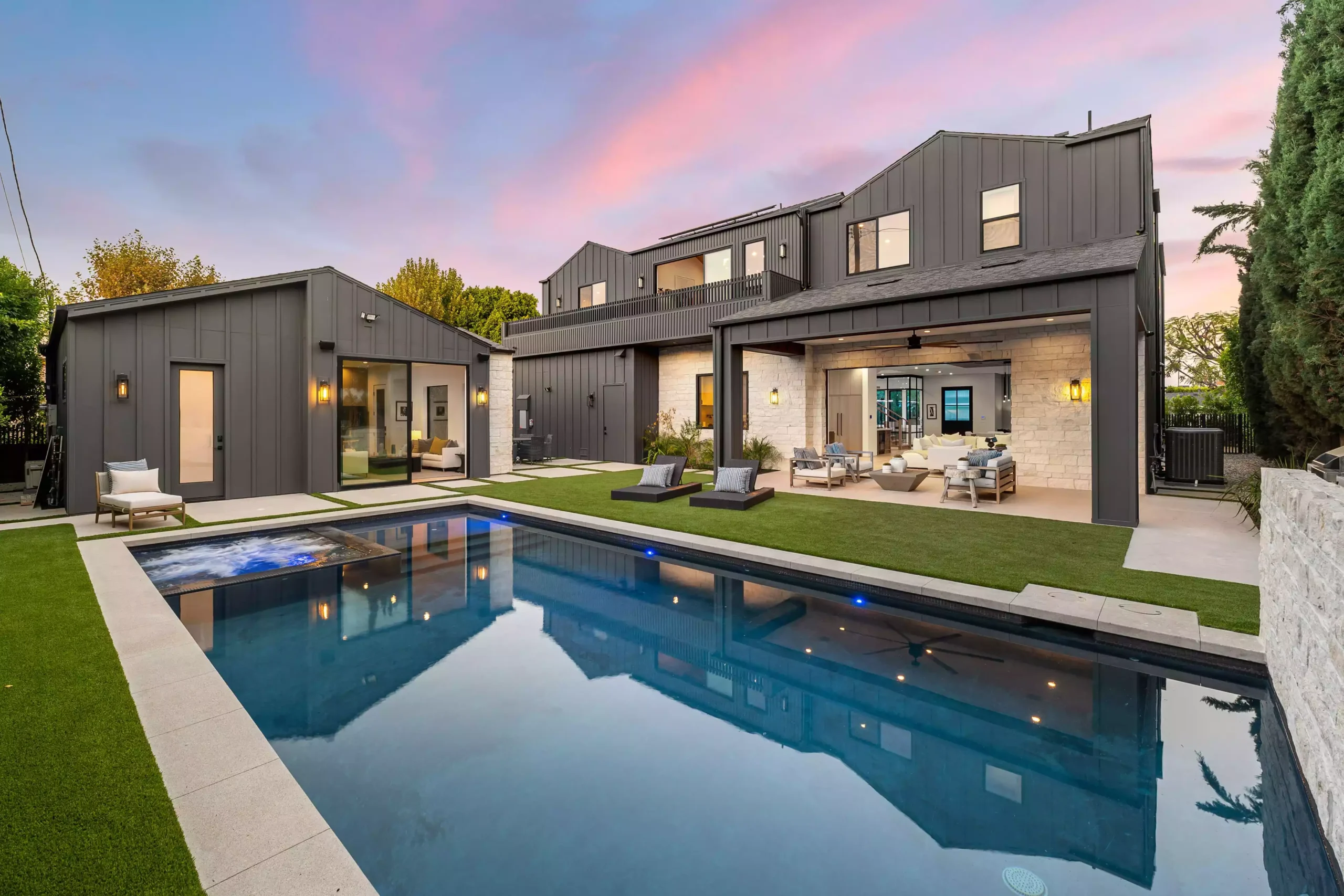 modern-luxury-home-with-pool-at-sunset-2024-10-23-22-34-12-utc